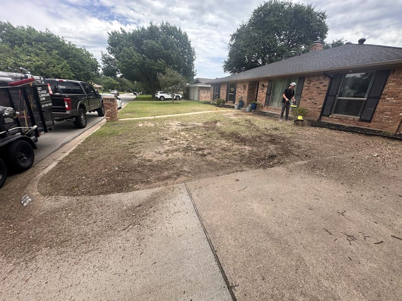 Front yard stripped and graded in preparation for new sod installation
